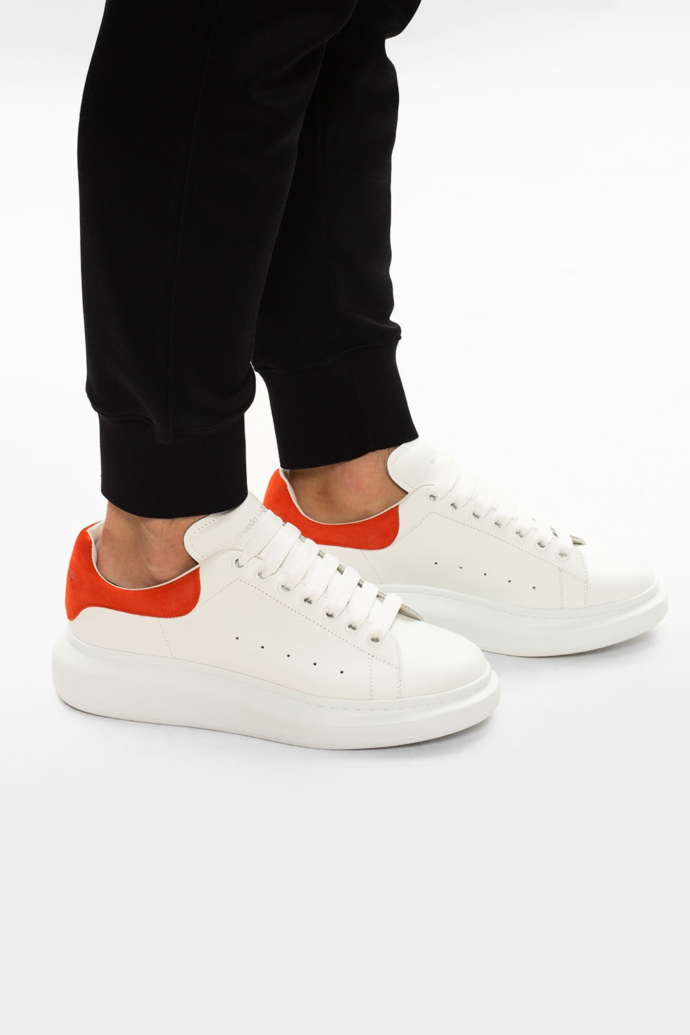 Orange and white alexander mcqueen sneakers best sale